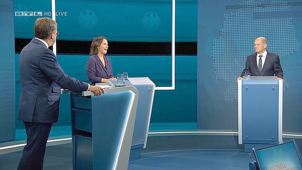 Die Kanzlerkandidaten Armin Laschet (l-r, CDU), Annalena Baerbock (Bündnis 90/Die Grünen) und Olaf Scholz (SPD) beim „Triell“ im Fernseh-Studio in Berlin-Adlershof. Foto: rtl/dpa