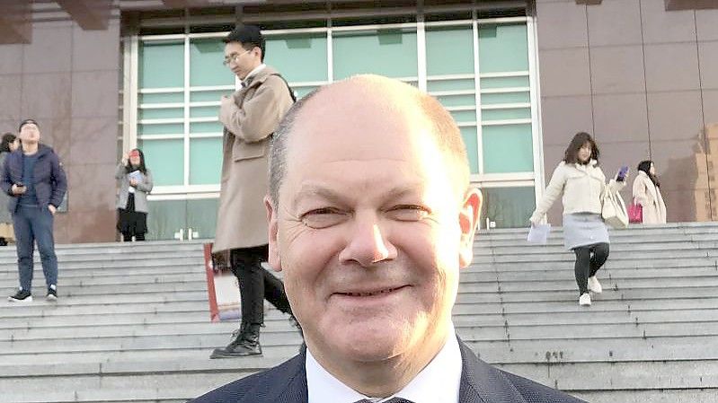 Der damalige Bundesfinanzminister Olaf Scholz in Peking. Foto: Georg Ismar/dpa/Archiv