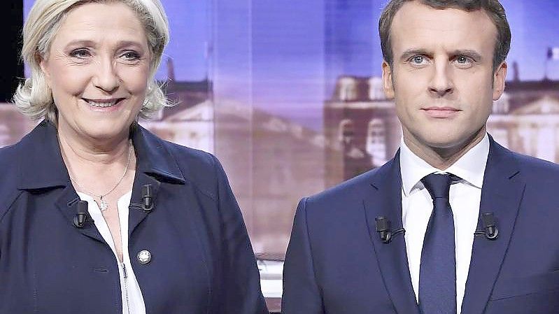 Marine Le Pen und Emmanuel Macron vor dem TV-Duell im Mai 2017. Wird das Aufeinandertreffen diesmal anders verlaufen?. Foto: Eric Feferberg/AFP POOL/AP/dpa