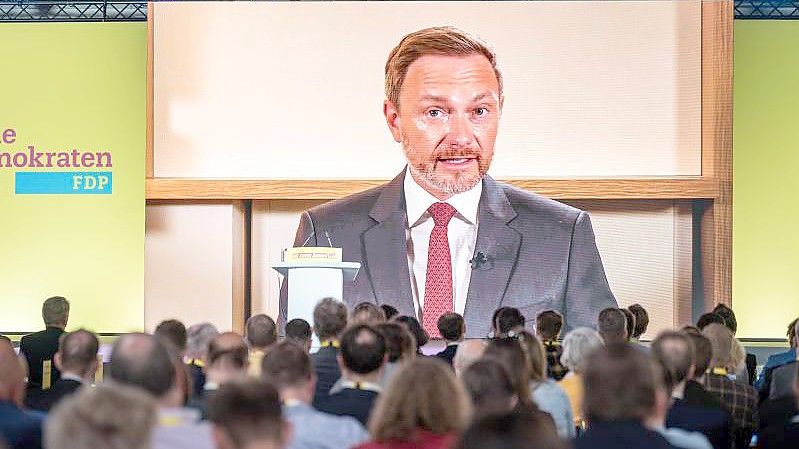 FDP-Bundesvorsitzender Christian Lindner spricht beim FDP-Bundesparteitag, digital aus Washington zugeschaltet. Foto: Michael Kappeler/dpa