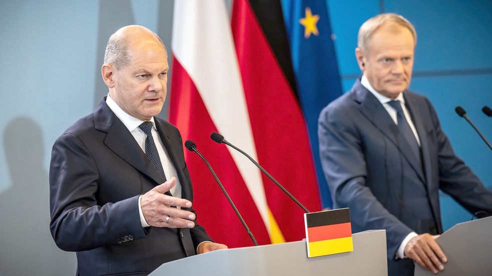 „Deutschland weiß um die Schwere seiner Schuld“, sagt Kanzler Olaf Scholz (l) bei einer Pressekonferenz mit Donald Tusk. Foto: Michael Kappeler/dpa