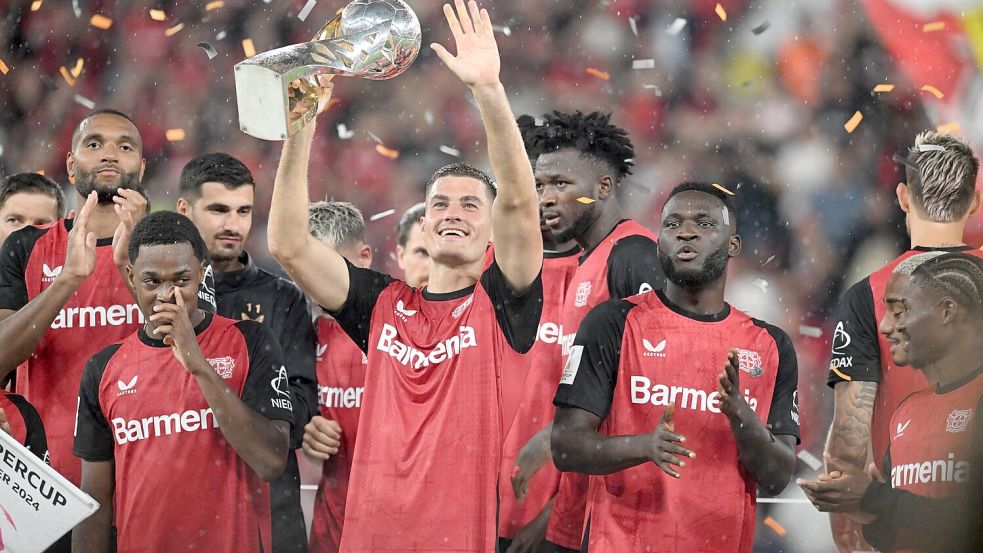 Die nächste Party. Mit dem Gewinn des Supercups schöpft Meister Leverkusen Mut für die neue Saison. Foto: Bernd Thissen/dpa