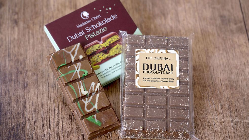 Ob selbstgemacht (l.) oder vom Händler: Dubai-Schokolade mit Pistaziencreme und Engelshaar ist in aller Munde. Foto: IMAGO/MiS