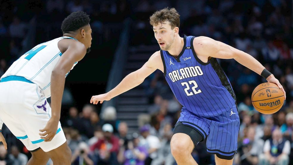 Weiterhin in Topform: Franz Wagner (r) und die Orlando Magic. Foto: Nell Redmond/AP/dpa